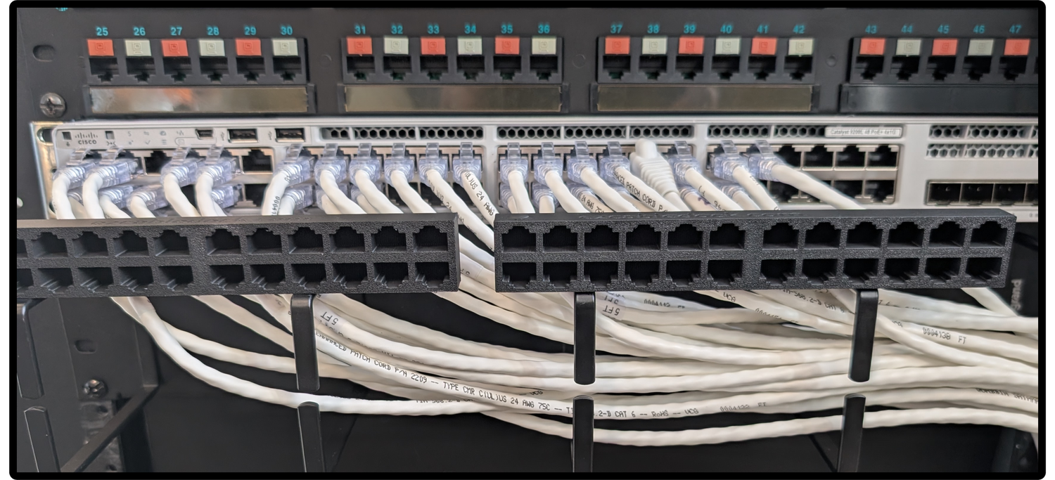 An image of a network switch with all Ethernet cables reconnected after being temporarily held in the EZ Cable Dock. The cables maintain their original arrangement, showcasing the dock’s function in streamlining switch replacements.